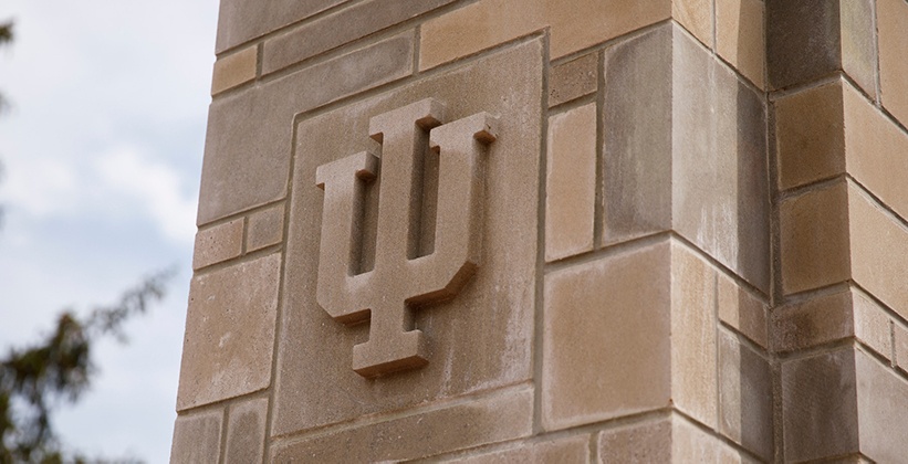 Brick building with rounded entrance on IU Southeast campus.