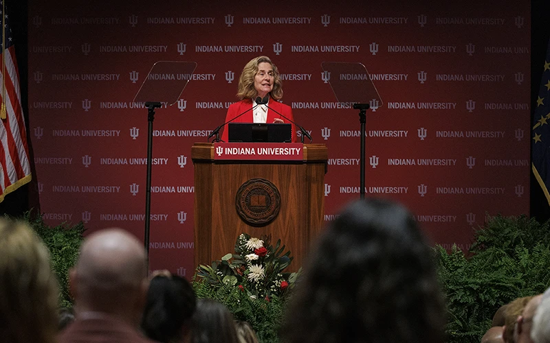 President Pamela Whitten speaks at the podium at the 2025 State of the University address